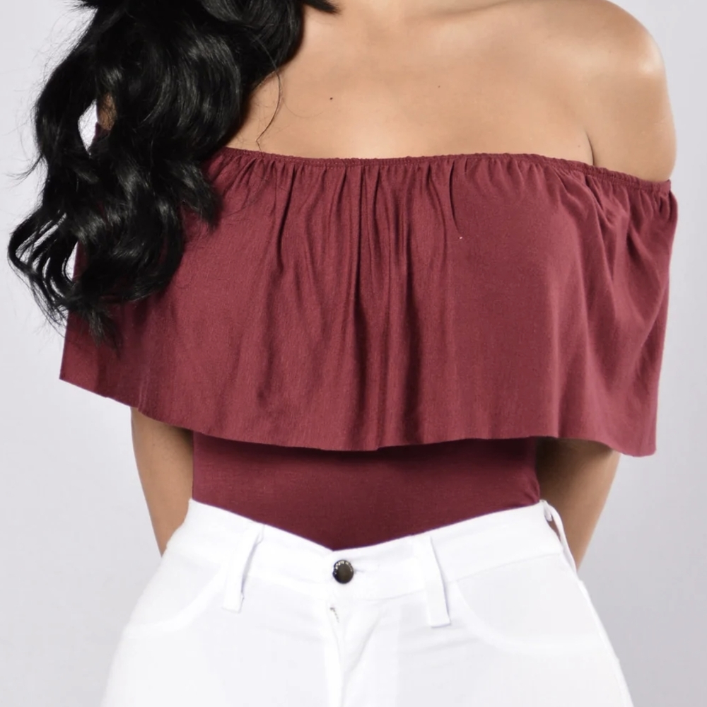 Four Fashion Nova body suits